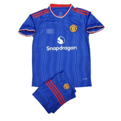 The image shows a blue Manchester United 2026/27 Away Jersey